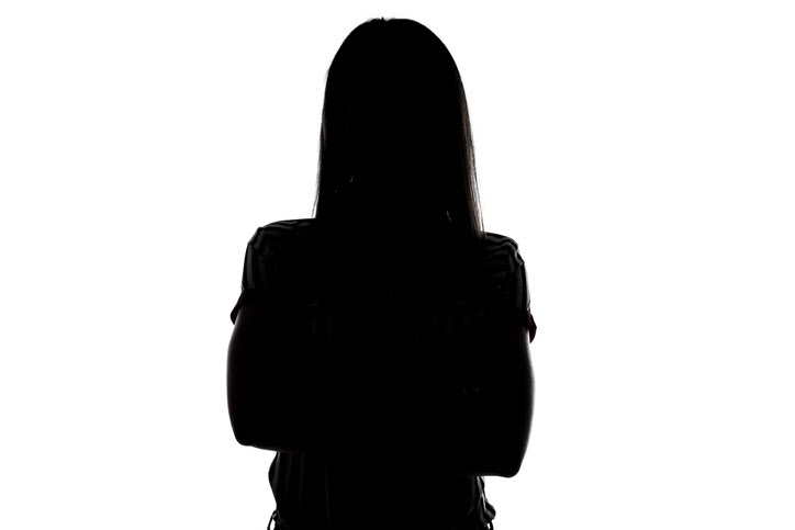 Silhouette of young woman on white background